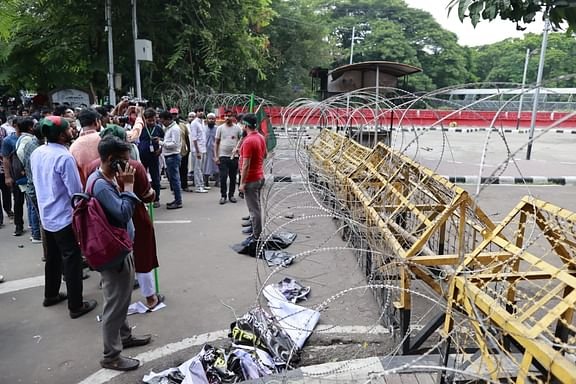 Dhanmondi No. 32 is blocked, people are standing with sticks